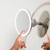 Rechargeable, the cordless mirror remains fully operational on the sction cup mount.